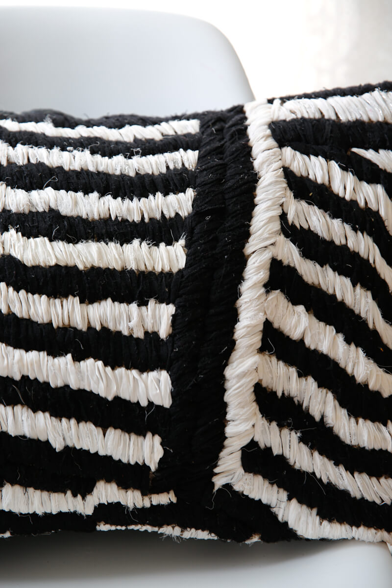 close up detail of handmade Moroccan Boucherouite pillow