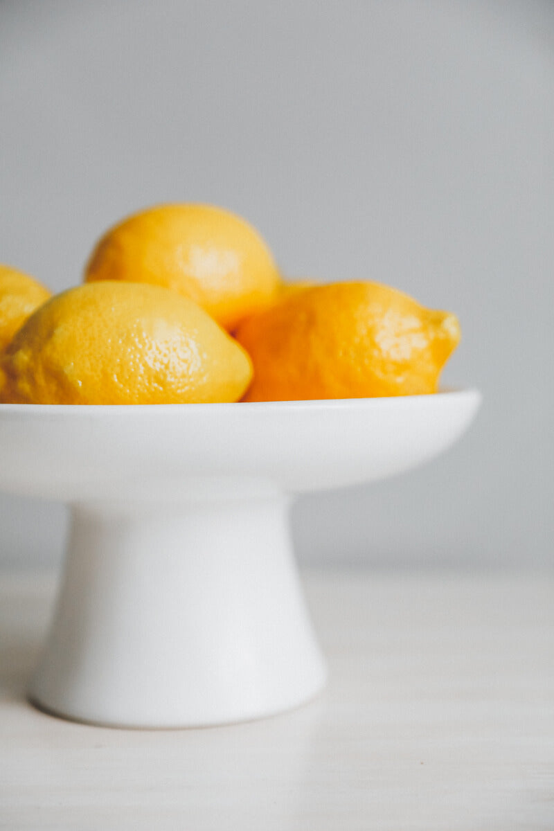 White kitchen, minimalist kitchen, fruit bowl, orange bowl