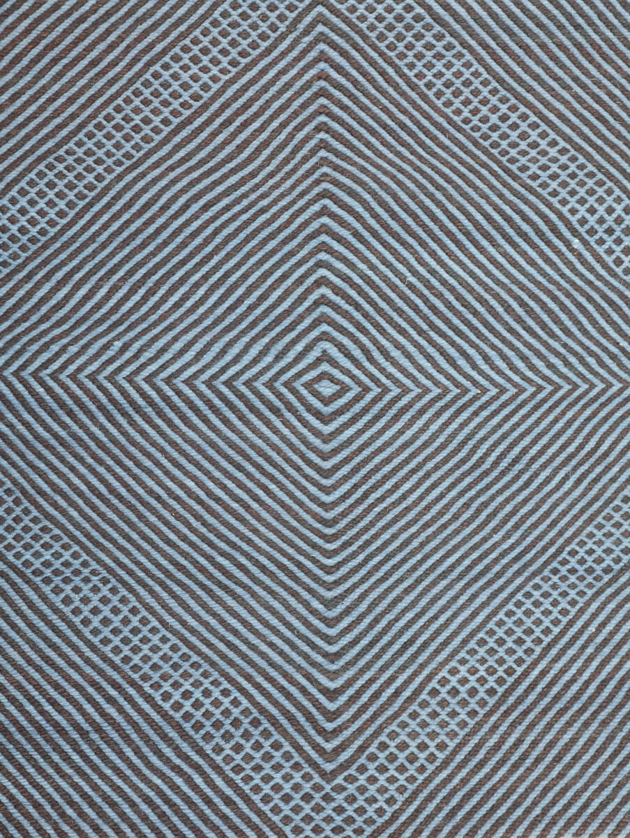Close up of Diamond pattern of Light Blue + Charcoal Made-to-order Zanafi Moroccan Wool Rug