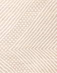 Close up of weaving on Champagne Blush + White Made-to-order Zanafi Moroccan Wool Rug