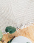 Detail from above of Champagne Blush + White Made-to-order Zanafi Moroccan Wool Rug