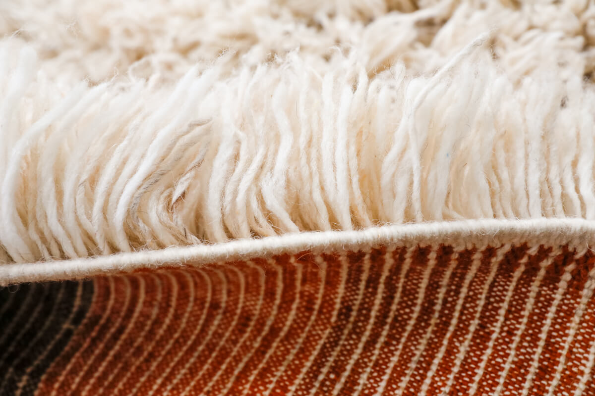 Made-to-order Sunset Reversible Shag Moroccan Wool Rug - Natural White with Striped Back