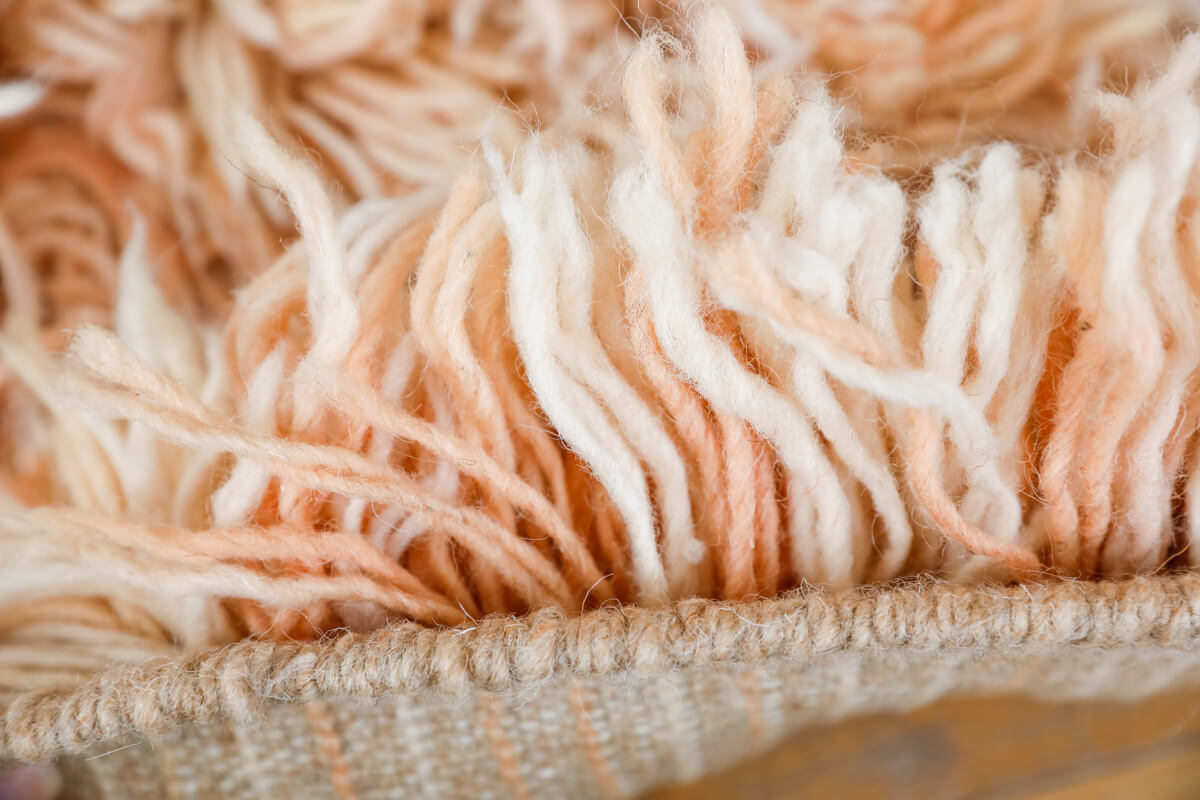 Reversible Peach and Pink Shag Moroccan Wool Rug With Beige Striped Backside