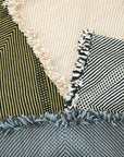 Detail showing various colored Zanafi Moroccan Wool Rugs