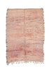 Blush Vintage Beni Mguild Moroccan Rug - 5 x 7' Beautiful soft blush pink with hints of gray, rose gold, Lavender with subtle hidden tribal symbols in purple and white. A very subtle and charming detail to this rug that otherwise reads as a solid.