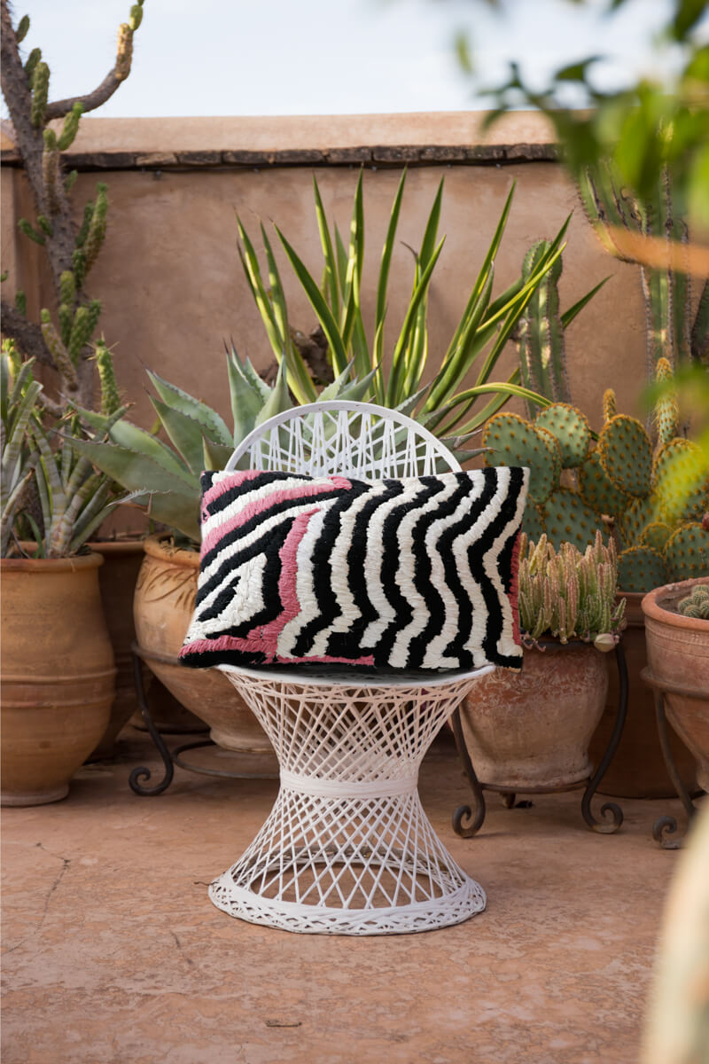 Black, white and pink Moroccan Boucherouite throw pillow