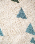 Close up detail photo of Ouive Jardin Moroccan wool rug
