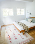 Solstice Moroccan wool rug in Marrakech Pink styled in clean midcentury modern bedroom