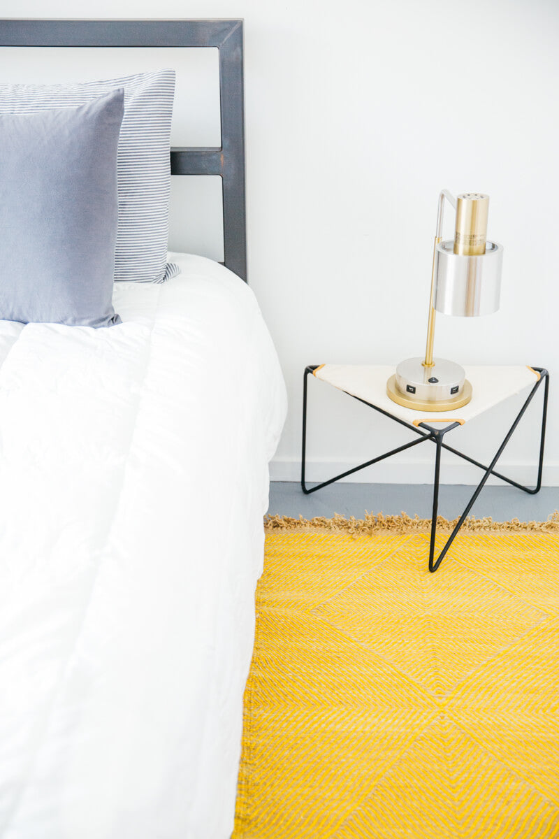 Yellow and Sand Flatweave Zanafi Moroccan Wool Runner Styled next to bed