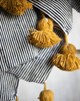 Moroccan Pom Pom Throw Blanket - Black and White Stripe with Mustard Yellow Pom-poms