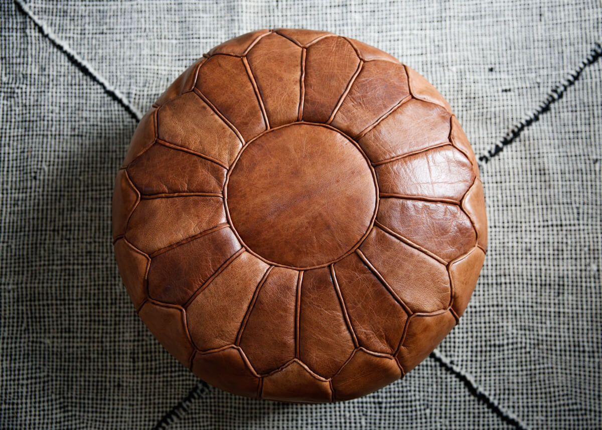 Toffee colored round natural leather pouf - 22&quot;x14&quot;inches