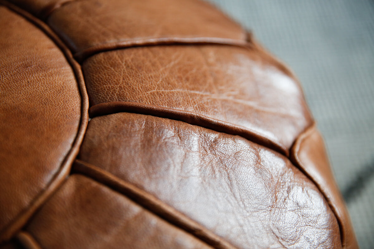 Toffee colored round natural leather pouf - 22&quot;x14&quot;inches