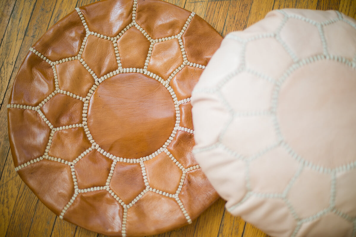 Small leather floor poufs