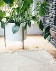 Champagne Blush + White Made-to-order Zanafi Moroccan Wool Rug close from floor angle