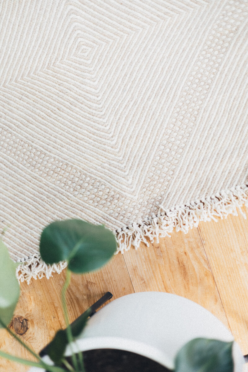 Detail from above of Champagne Blush + White Made-to-order Zanafi Moroccan Wool Rug