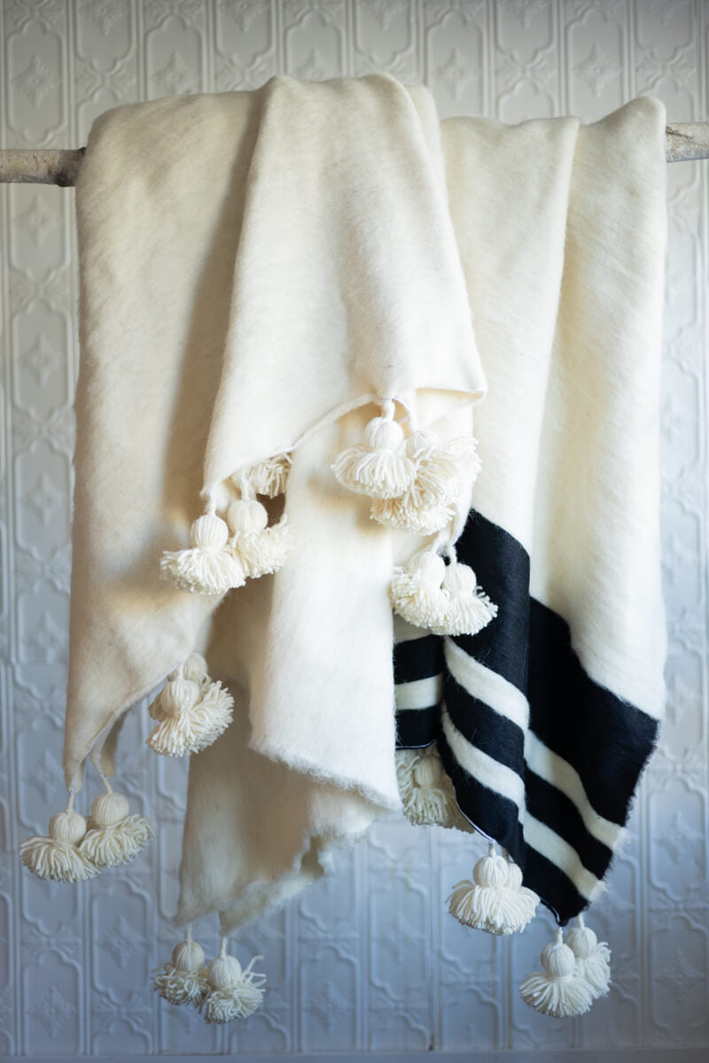 Natural pom pom discount throw